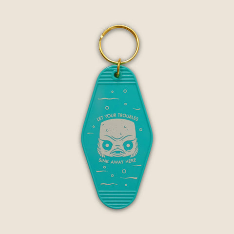 Gilly's Cryptid Cove Motel Room Keychain